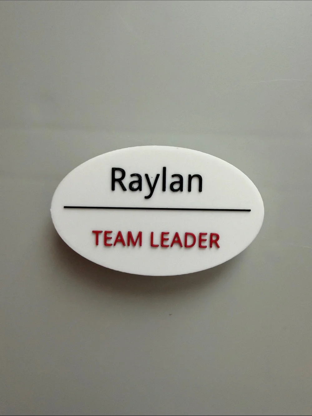 Magnetic Raylan Team Leader Oval Name Badge - White/Black/Red